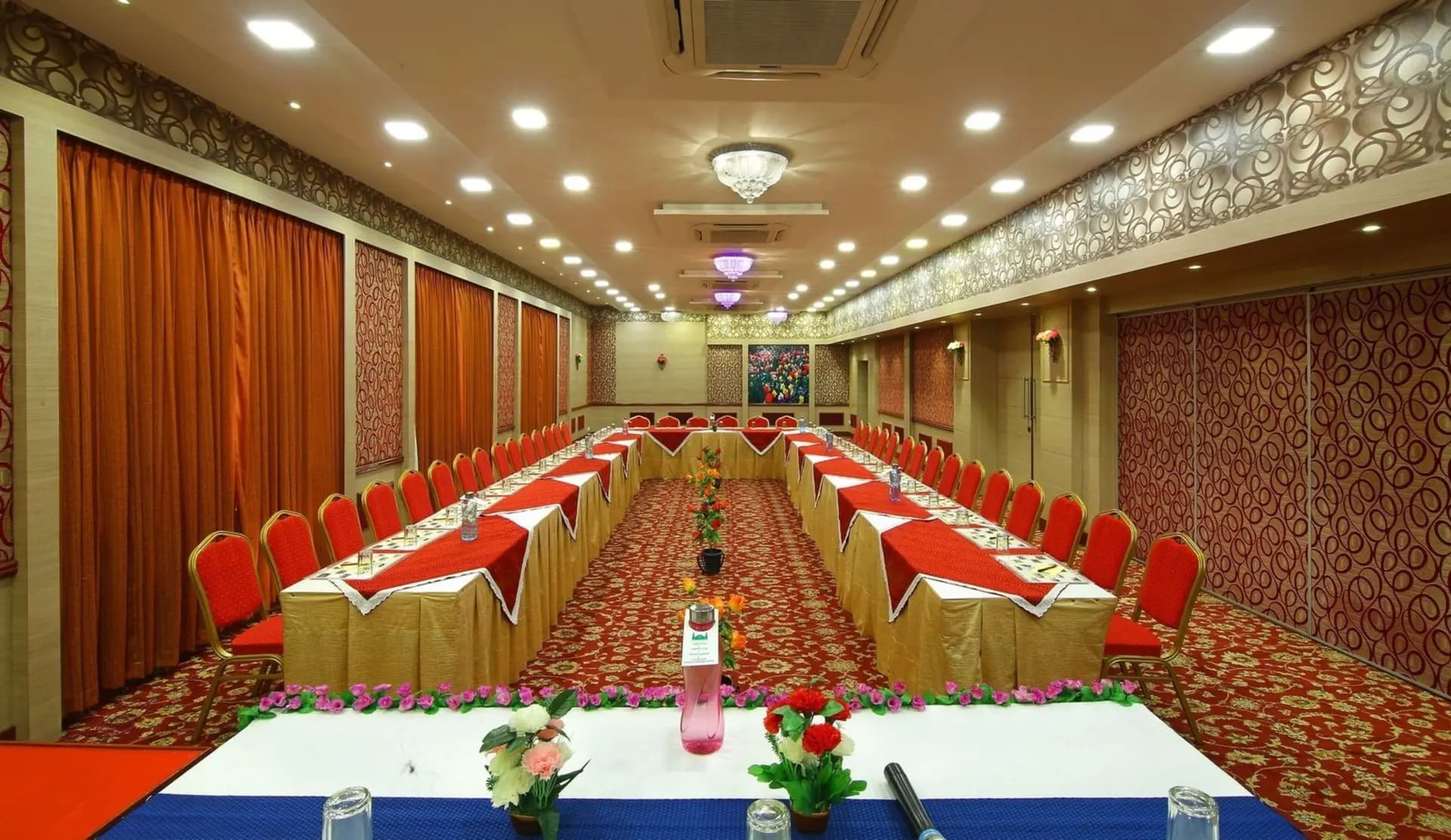 Banquet tables dressed for a 250-guest function at Royal Court Madurai